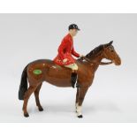 Beswick huntsman on horse with black cap and red jacket, 21cm