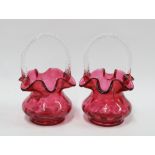 Pair of cranberry glass posy baskets with clear barley twist handles, 19cm (2)