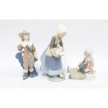 Lladro figures ‘Musketeer Athos’ No 6121, girl with goose and another (3) 27cm.
