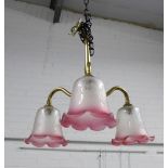 Christopher Wray brass three branch light fitting with pink and white glass shades, 40cm.