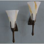 Pair of Chelsom bronze patinated metal wall sconce lights with white and yellow glass shades,