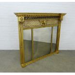 An impressive NeoClassical style giltwood overmantle mirror, inverted breakfront with acanthus and