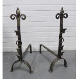 Pair of modern metal fire dogs, 68 x 49cm. (2)