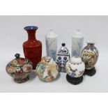 A collection of Chinese and Japanese vases to include a pair of Japanese blue and white porcelain