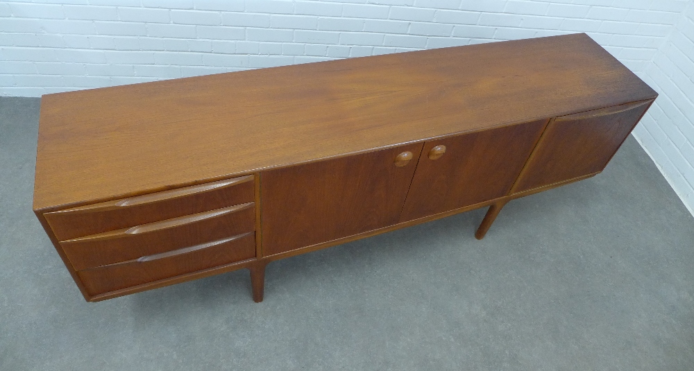 A.H. McIntosh, teak sideboard with a pair of cupboard doors, flanked on one side to a fall front, - Image 2 of 4