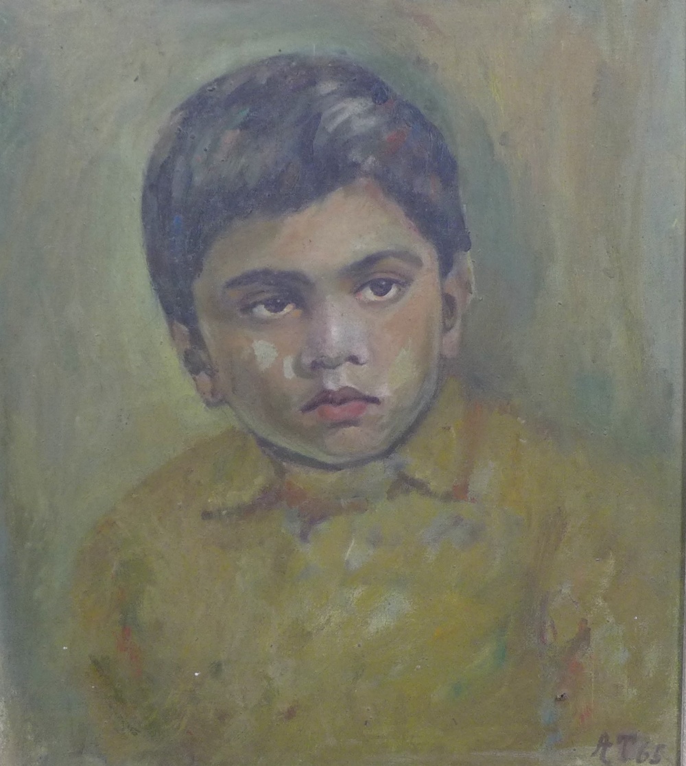 20th century Indian School, head and shoulders portrait of a boy, oil on canvas, signed with
