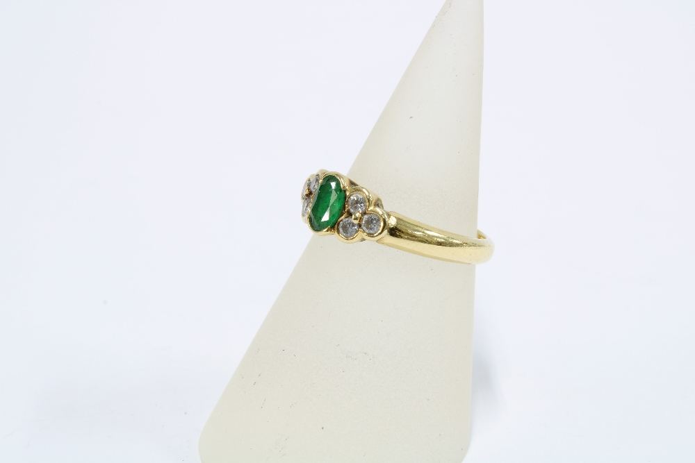 18ct gold emerald & diamond dress ring, with an oval emerald flanked by three bright cut diamonds, - Image 3 of 4