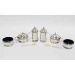 George VI six piece silver cruet set, Fenton, Russell & Co Ltd, Birmingham 1941, with blue glass