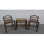Pair of oak low chairs with canework seats together with a matching stool. 62 x 40 x 37cm. (3)