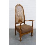 Early 20th century mahogany open armchair, high back with bergere cane work and cushion seat. 110