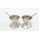 Two French pewter salts, impressed marks to base, with salt spoons, 6cm high (2)