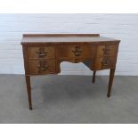 Mahogany ledgeback bow fronted sideboard on tapering legs, 107 x 78 x 52cm.