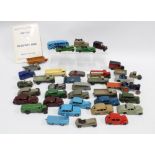 Collection of vintage Dinky cars and Dinky Toys Collector Guide etc