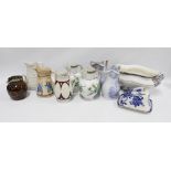 Collection of Staffordshire and other pottery, including jugs, tallest 22cm, a butter dish, and a