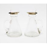 A pair of George V silver mounted glass whisky noggins, by Hukin & Heath Ltd, Birmingham 1911,
