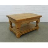 Pine coffee table, rectangular top, bold legs and undertier, 90 x 50 x 60cm.