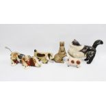 Collection of painted wooden animal figures and toys, including a vintage Fisher Price Snoopy 35cm