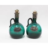 Two green glass and Epns mounted decanters with 'Whisky' and 'Brandy' labels, 20cm (2)