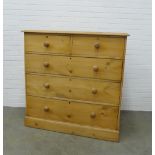 Pine chest, the moulded rectangular top above two short and three long graduating drawers on a