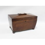 A large 19th century mahogany sarcophagus box, hinged lid with three internal compartments, standing