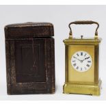 Brass cased repeater carriage clock with bevelled glass panels, leather case