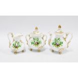 Rockingham style miniature porcelain floral gilt teapot, cream jug and sugar bowl, 12cm (3)
