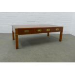 Yew wood Campaign style coffee table, 121 x 40 x 61cm.