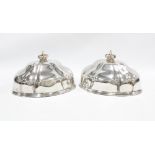 A pair of Victorian silver plate meat dish covers with silver crown finials, London 1841, 28cm