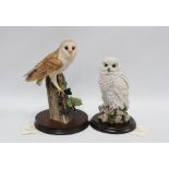 Two Country Artists owls, 'Snowy Owl' CA399 and a barn owl, taller 26cm