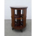 Mahogany & inlaid revolving bookcase of circular form, 58 x 81cm.