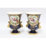 A pair of campana vases, blue scale ground with exotic bird panels, each with a Worcester style