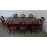 Mahogany triple pedestal dining table together with a set of eight George III style mahogany
