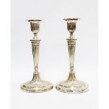 AQ pair of late Victorian silver candlesticks, Fordham & Faulkner, Sheffield 1900, of Georgian