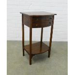 Edwardian mahogany table, bow front top over two drawers with an undertier, 41 x 70 x 41cm.