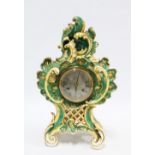 Rococo style mantle clock with silvered dial and Roman numerals, (a/f)