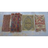 A group of four Eastern prayer mats, largest 86 x 50cm (4) (a/f)