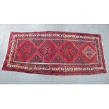Hamadan runner, red field with four medallions, shortened, 236 x 110cm (a/f)