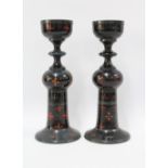 Pair of black lacquered wooden candle holders, 32cm (2)