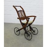 Childs vintage pusher chair, 67 x 28cm.