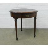Mahogany table, oval top with a frieze drawer on tapering legs and spade feet, 69 x 70 x 52cm.