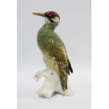 Karl Ens porcelain woodpecker figure, printed factory backstamp and impressed number 7527, 25cm cm