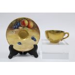 Royal Worcester fruit painted cabinet cup and saucer, puce backstamp (2)