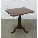 19th century mahogany rise and fall table, rectangular serpentine top with moulded edge, on