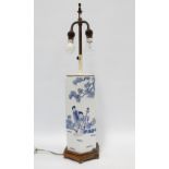 Chinoiserie blue and white table lamp, hexagonal and decorated with figure beneath prunus trees,