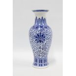 Chinese blue and white baluster vase with stylised decoration of flowers and foliage, 32cm