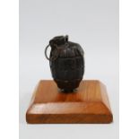 WWI Deactivated 1916 British Mills No23 Mk2 Fragmentation grenade mounted on a plinth