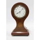 Edwardian mahogany cased mantle clock with inlaid paterae, the circular enamel dial with Arabic
