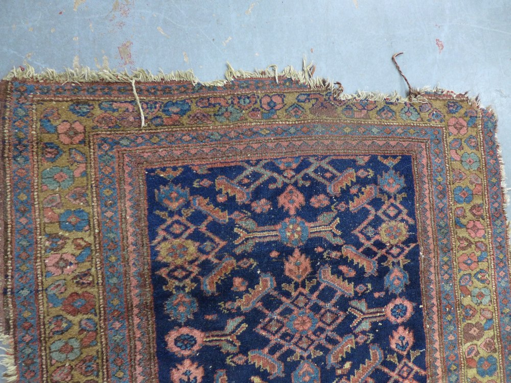 North West Persian rug, indigo field, a/f with losses from the end 195 x 116cm - Image 3 of 4