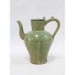 Chinese celadon pot with handle and long spout, likely 20th century, 20cm Provenance: Private