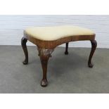 George II style walnut centre stool of hourglass shape with an upholstered top, the cabriole legs